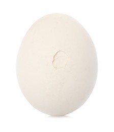 Photo of One egg with cracked shell isolated on white