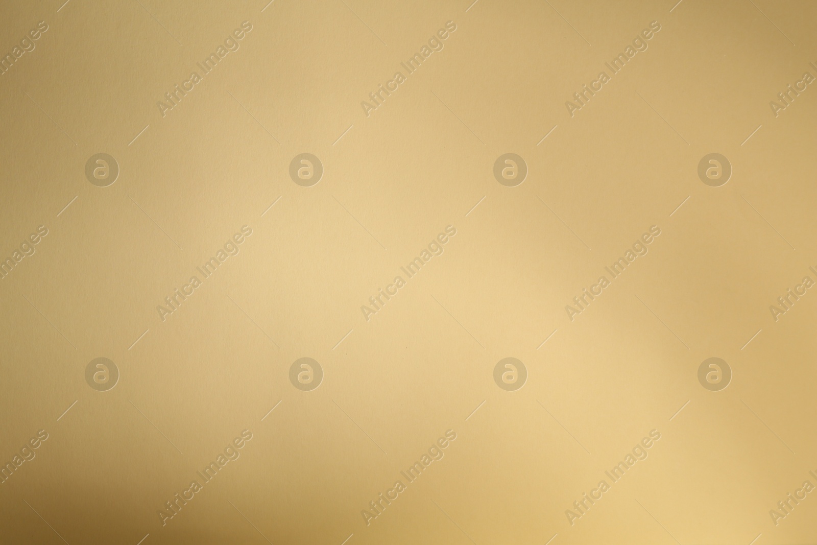 Photo of Light and shadow falling on beige background