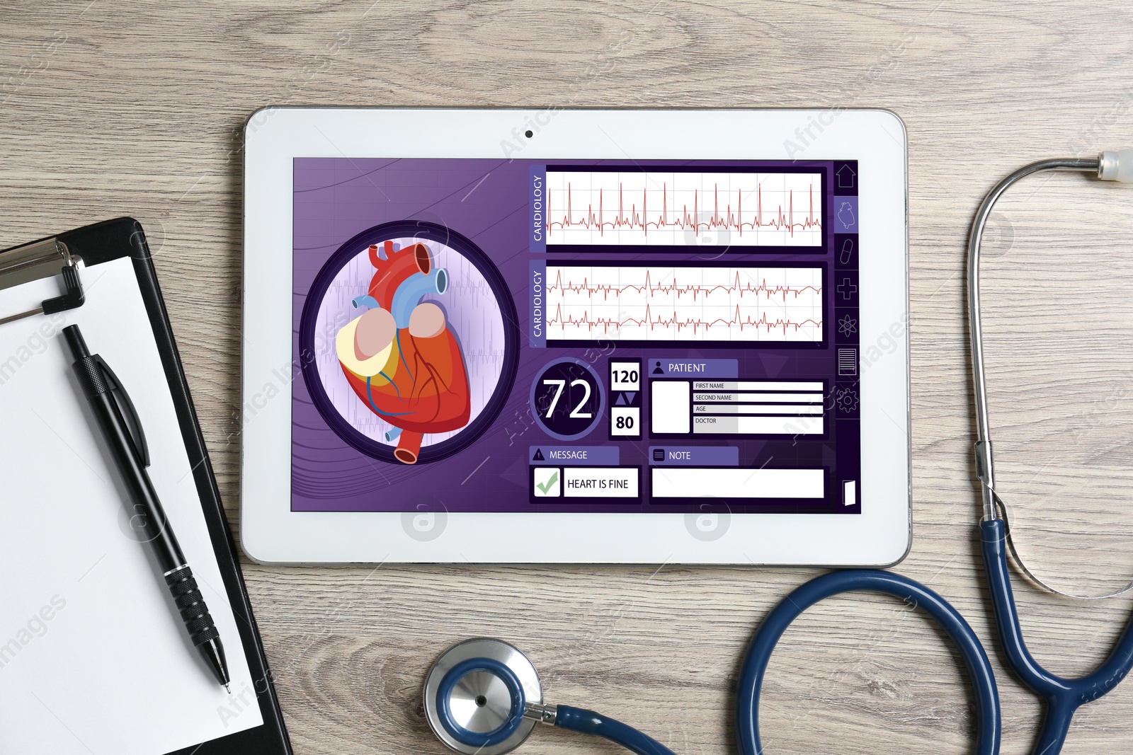 Image of Cardiology. Doctor's workplace with stethoscope and tablet computer on wooden table, top view. Data on device screen