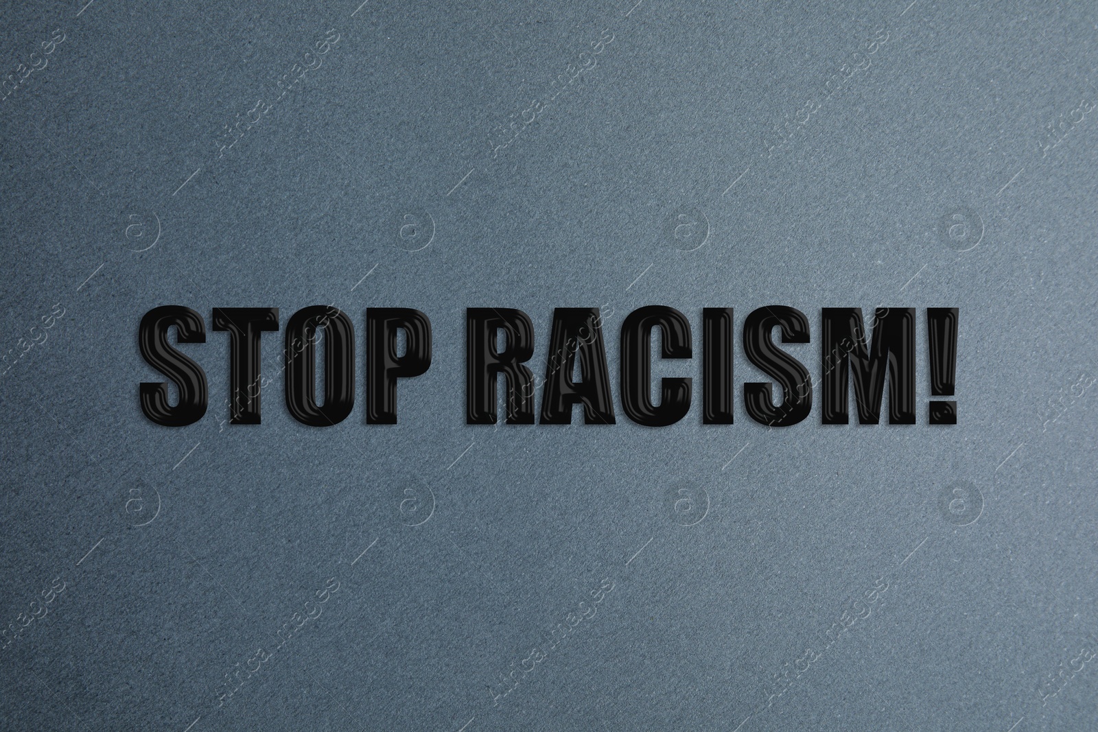 Image of Stop Racism! Black text on grey background