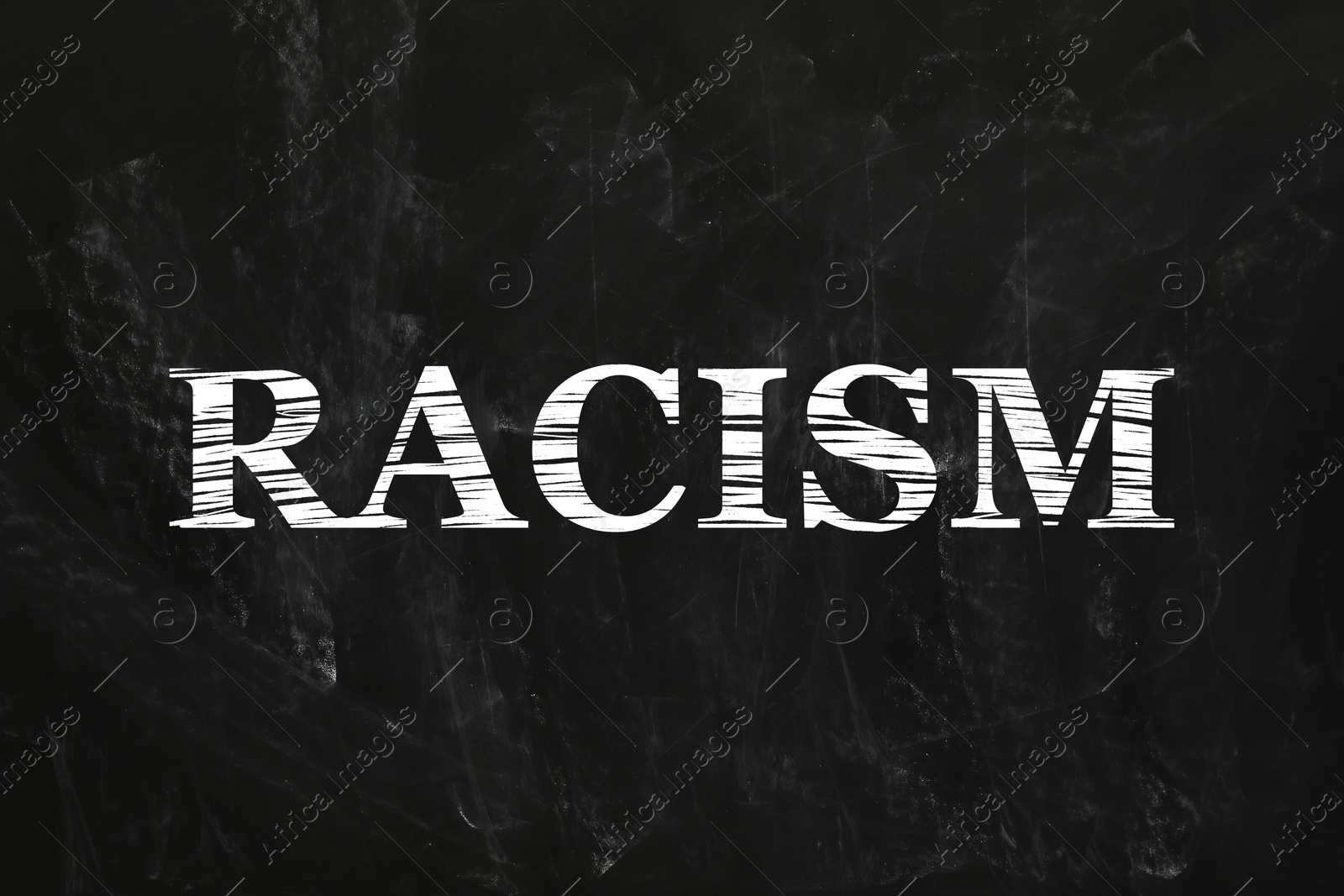 Image of Stop racism concept. Word on black chalkboard