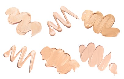 Image of Liquid foundation of different shades. Samples on white background, set