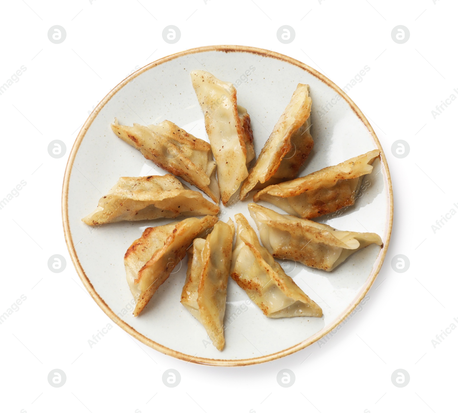 Photo of Tasty fried gyoza dumplings isolated on white, top view