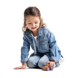 Photo of Little girl playing with toy car on white background