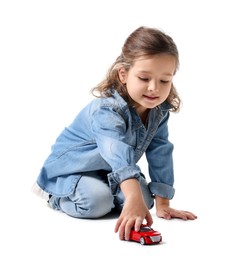 Photo of Little girl playing with toy car on white background