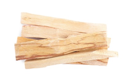 Photo of Palo santo sticks on white background, top view