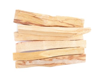 Photo of Palo santo sticks on white background, top view