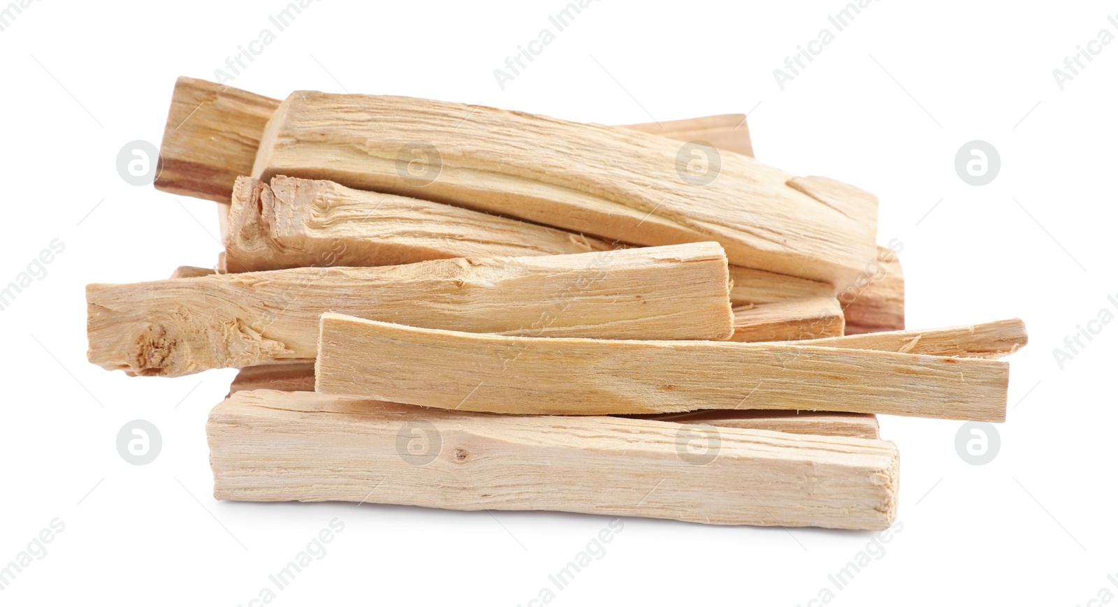 Photo of Pile of palo santo sticks on white background