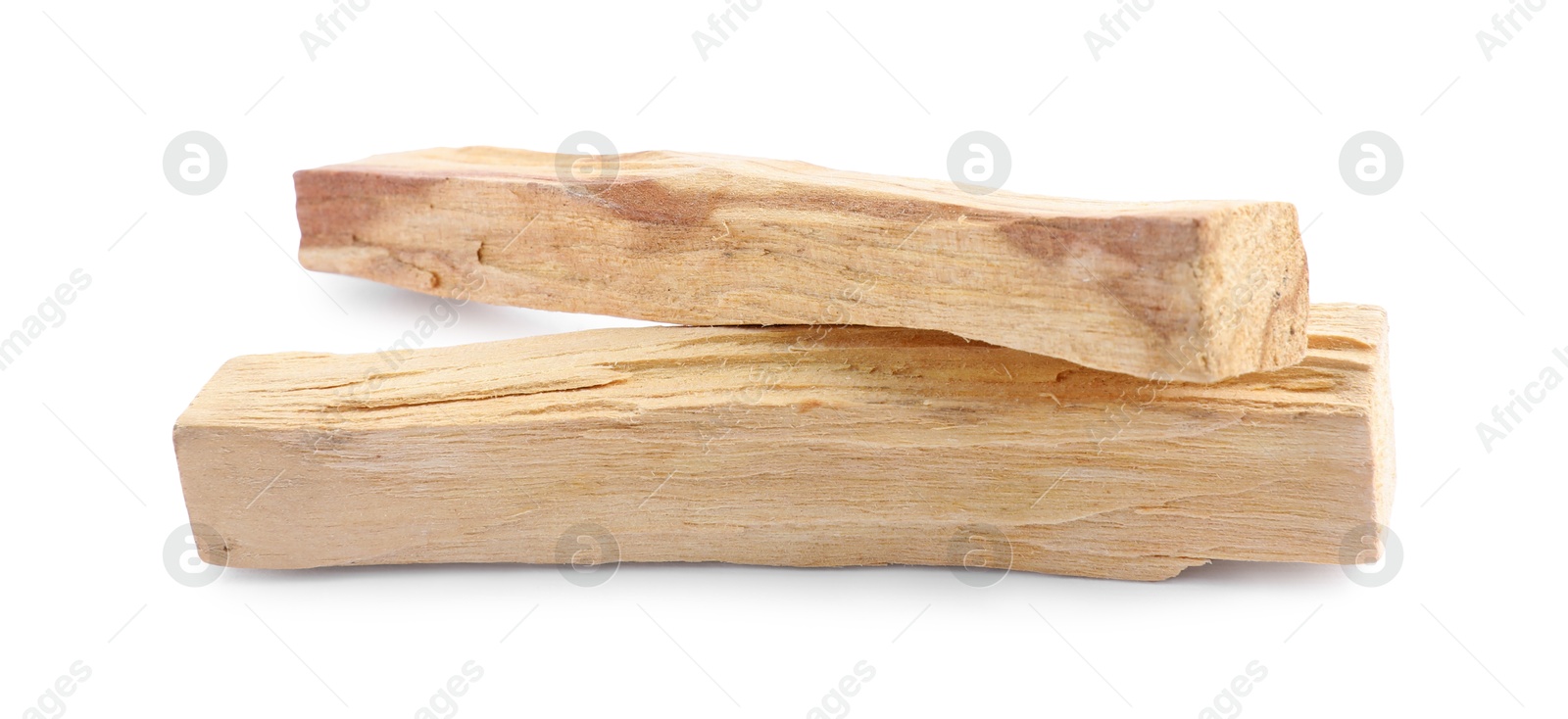 Photo of Two palo santo sticks on white background