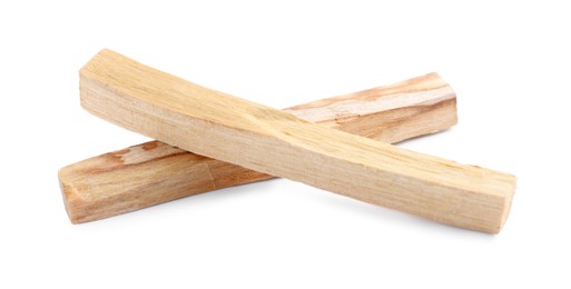 Photo of Two palo santo sticks on white background