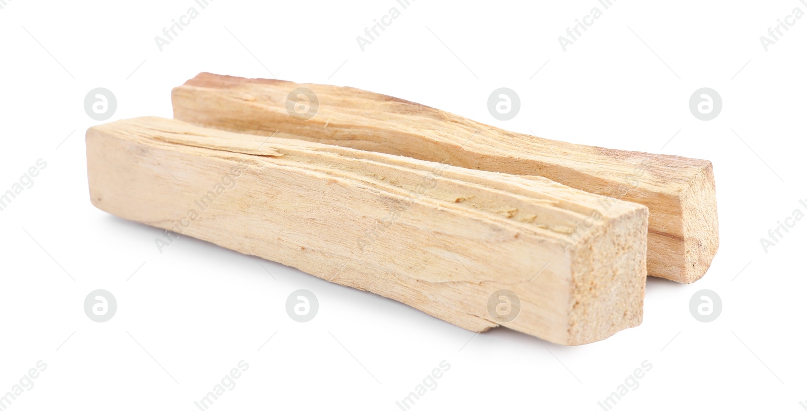 Photo of Two palo santo sticks on white background