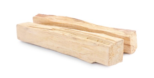 Photo of Two palo santo sticks on white background