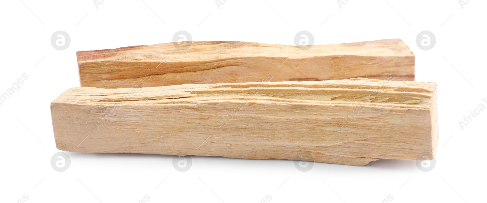 Photo of Two palo santo sticks on white background