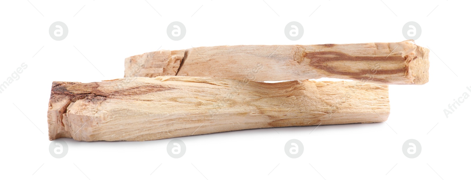 Photo of Two palo santo sticks on white background