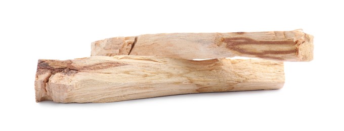 Two palo santo sticks on white background