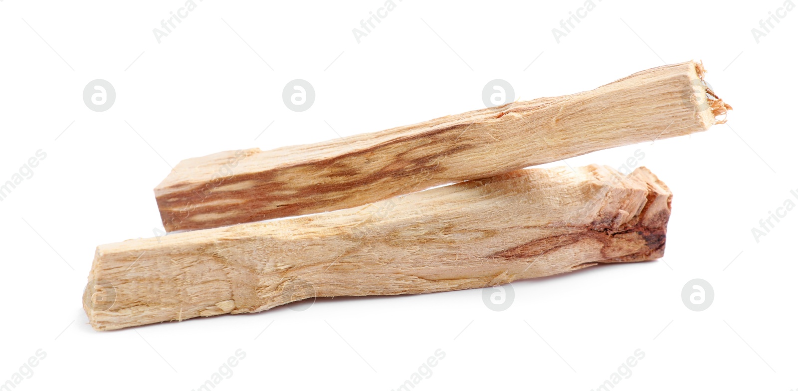 Photo of Two palo santo sticks on white background