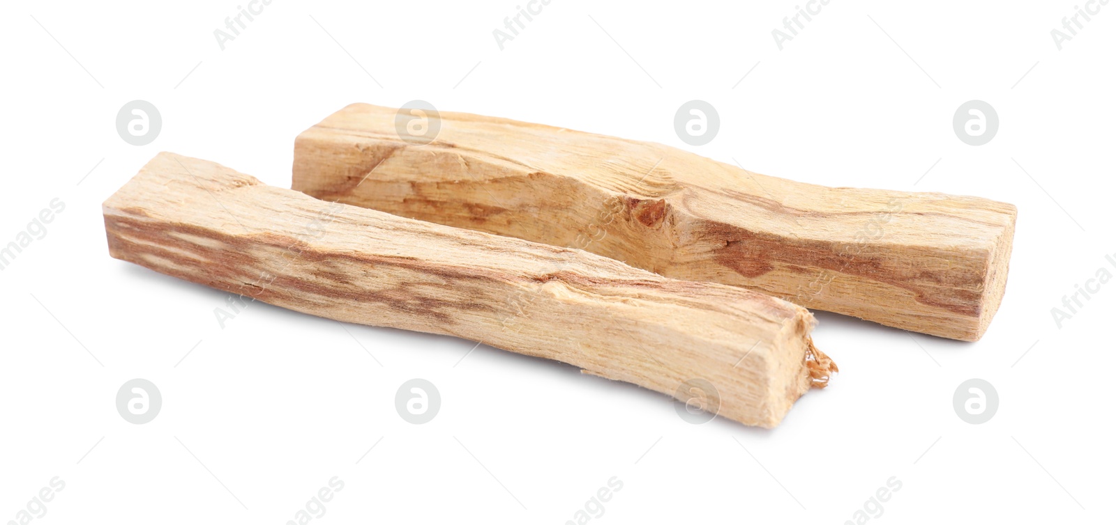 Photo of Two palo santo sticks on white background