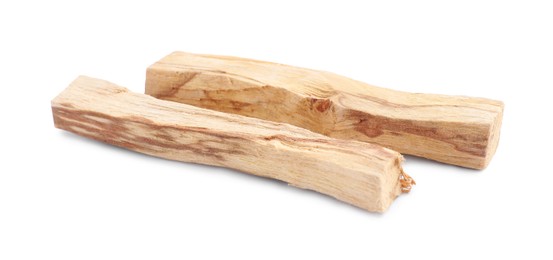 Photo of Two palo santo sticks on white background