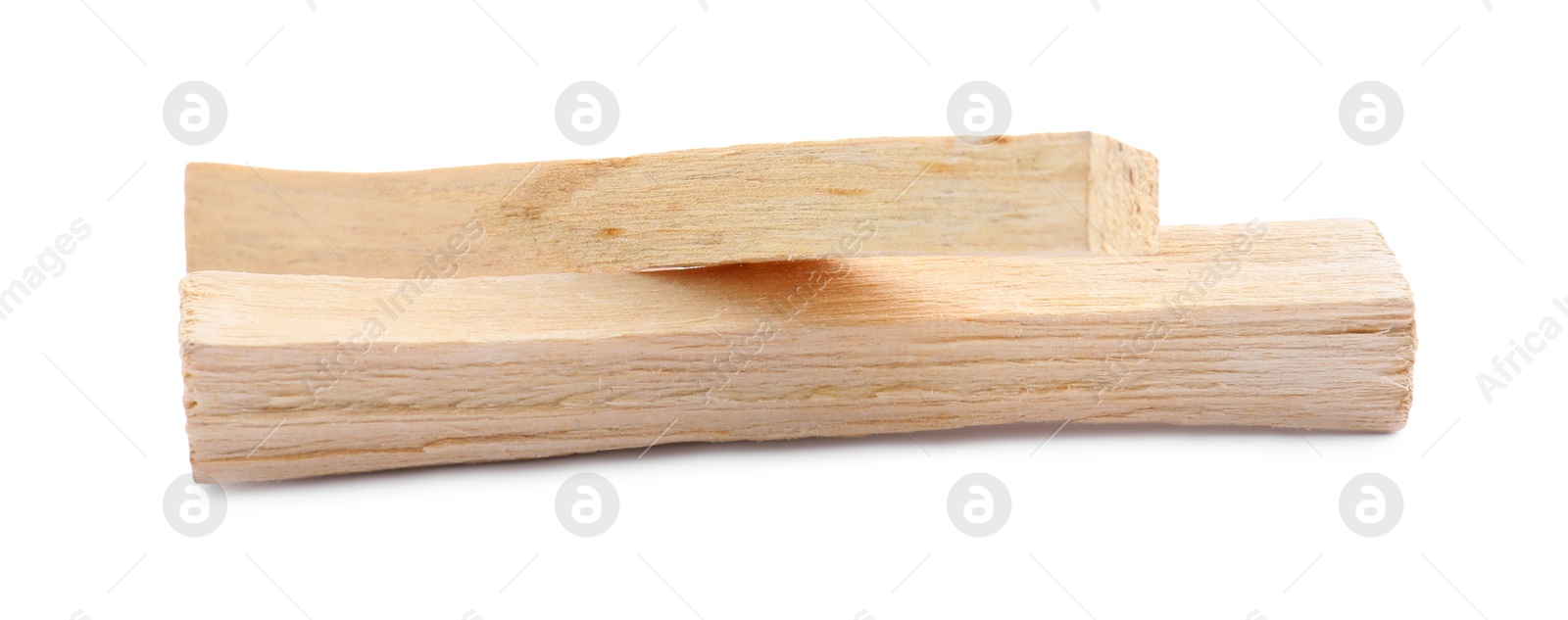 Photo of Two palo santo sticks on white background