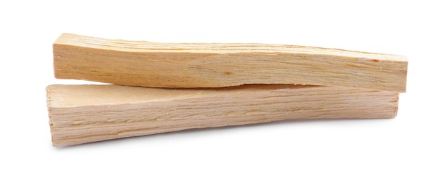 Two palo santo sticks on white background