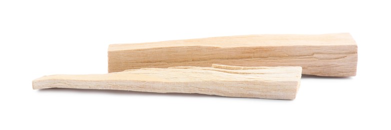 Photo of Two palo santo sticks on white background