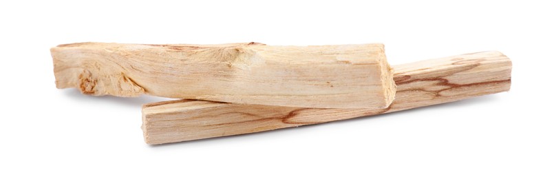 Photo of Two palo santo sticks on white background