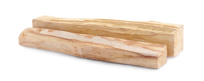 Photo of Two palo santo sticks on white background