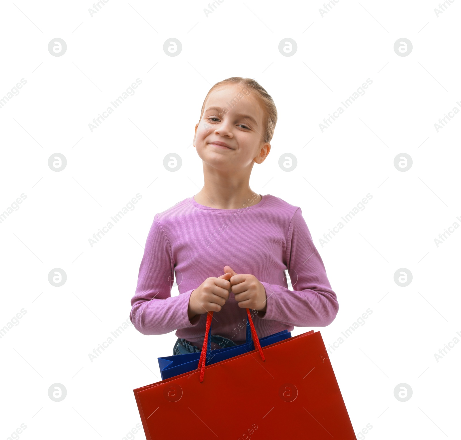 Photo of Cute little girl with shopping bags on white background