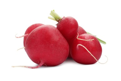 Photo of Many fresh ripe radishes isolated on white