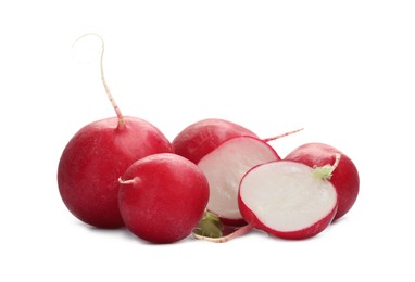 Photo of Whole and cut radishes isolated on white