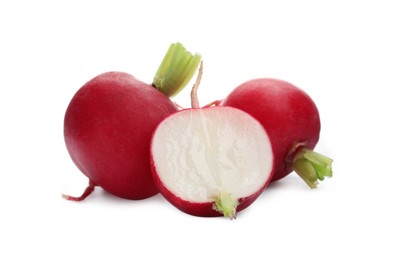 Photo of Whole and cut radishes isolated on white