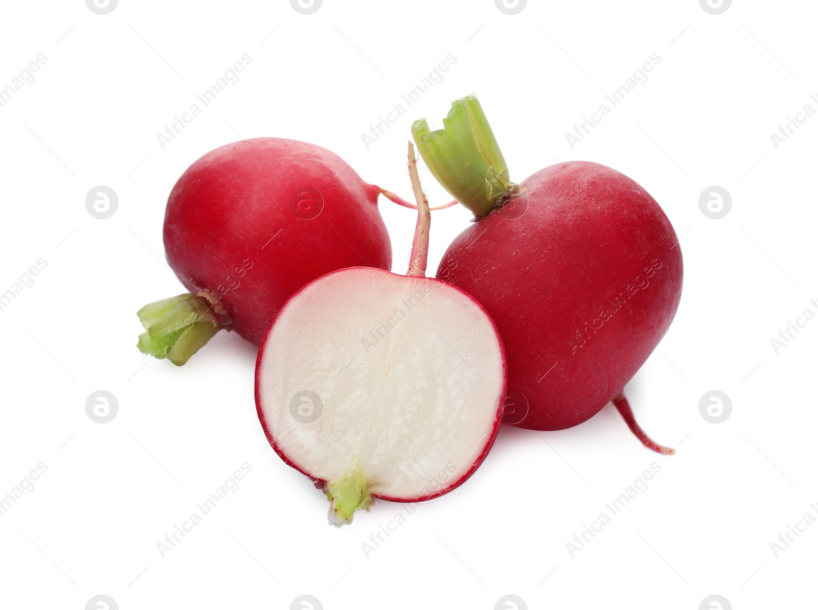 Photo of Whole and cut radishes isolated on white