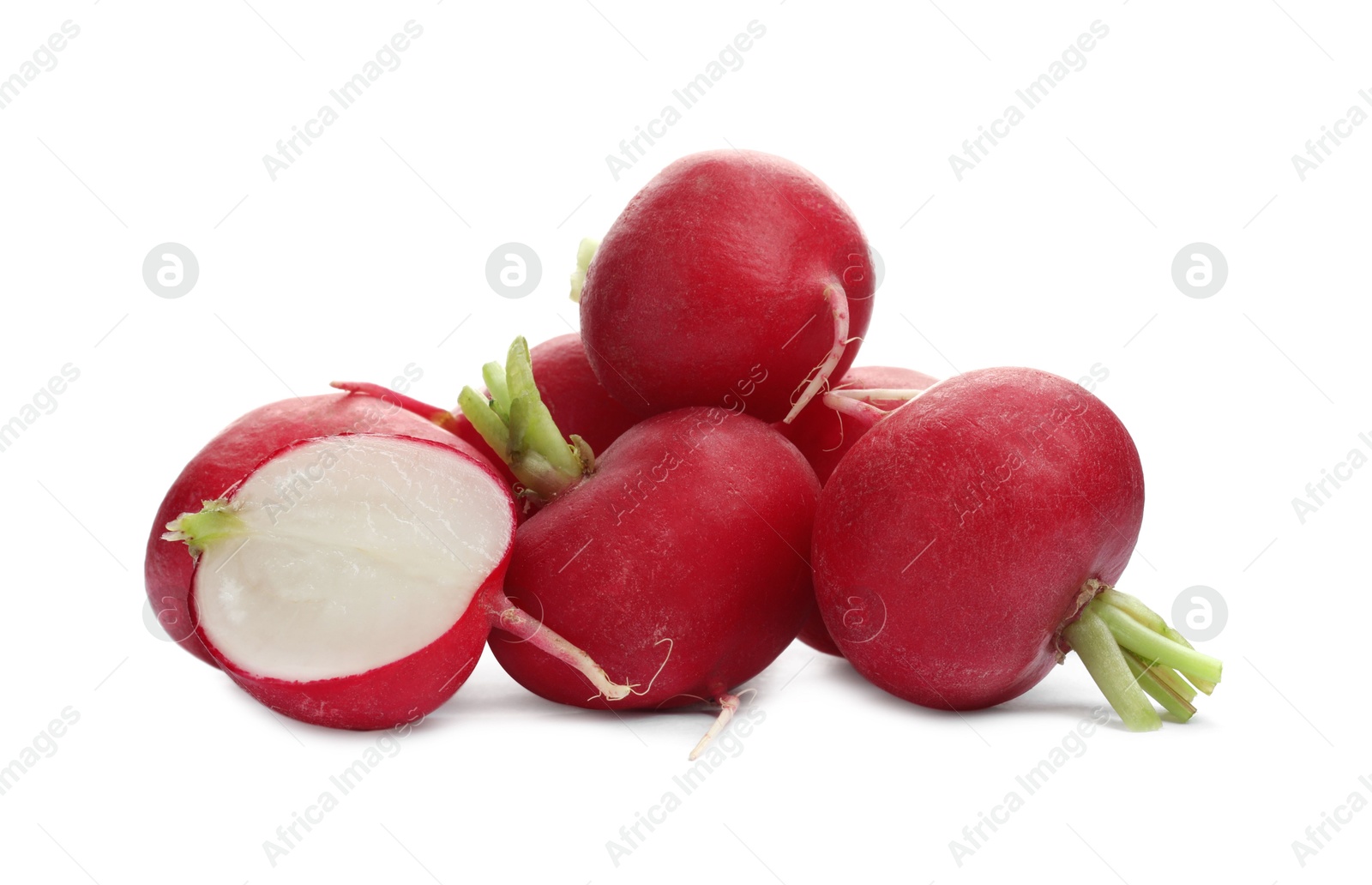 Photo of Whole and cut radishes isolated on white