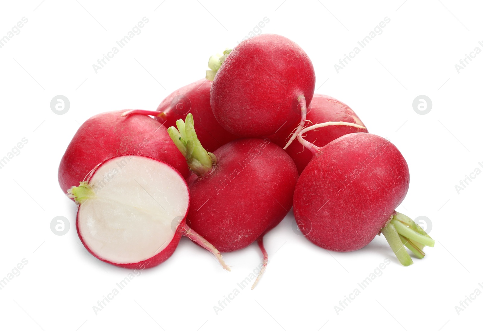 Photo of Whole and cut radishes isolated on white