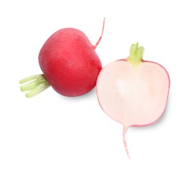 Photo of Whole and cut radishes isolated on white, top view