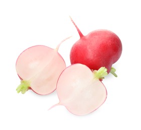 Photo of Whole and cut radishes isolated on white, top view