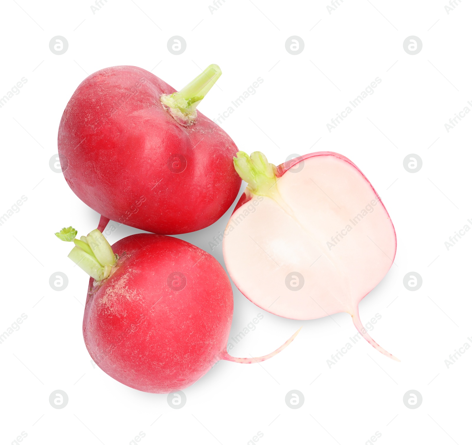 Photo of Whole and cut radishes isolated on white, top view