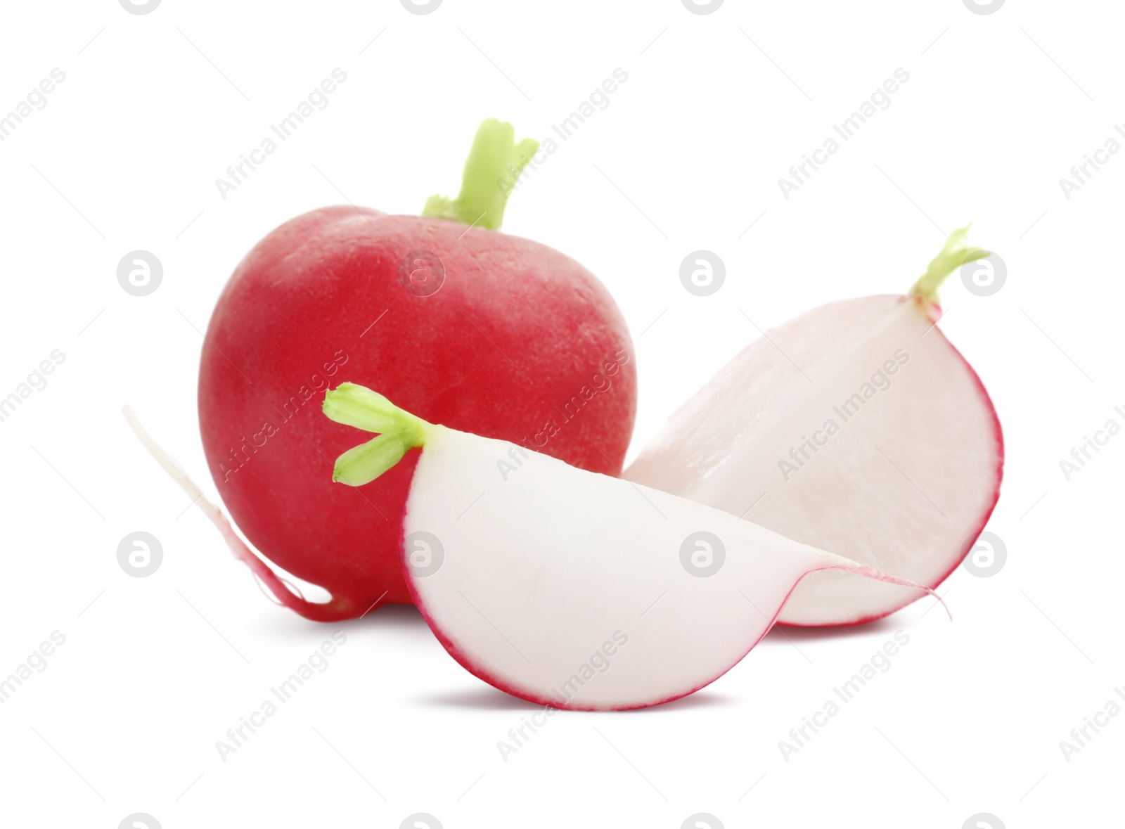 Photo of Whole and cut radishes isolated on white