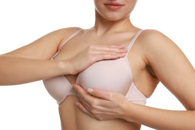 Photo of Woman wearing beautiful bra on white background, closeup