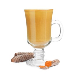 Photo of Delicious turmeric latte in glass cup and roots isolated on white