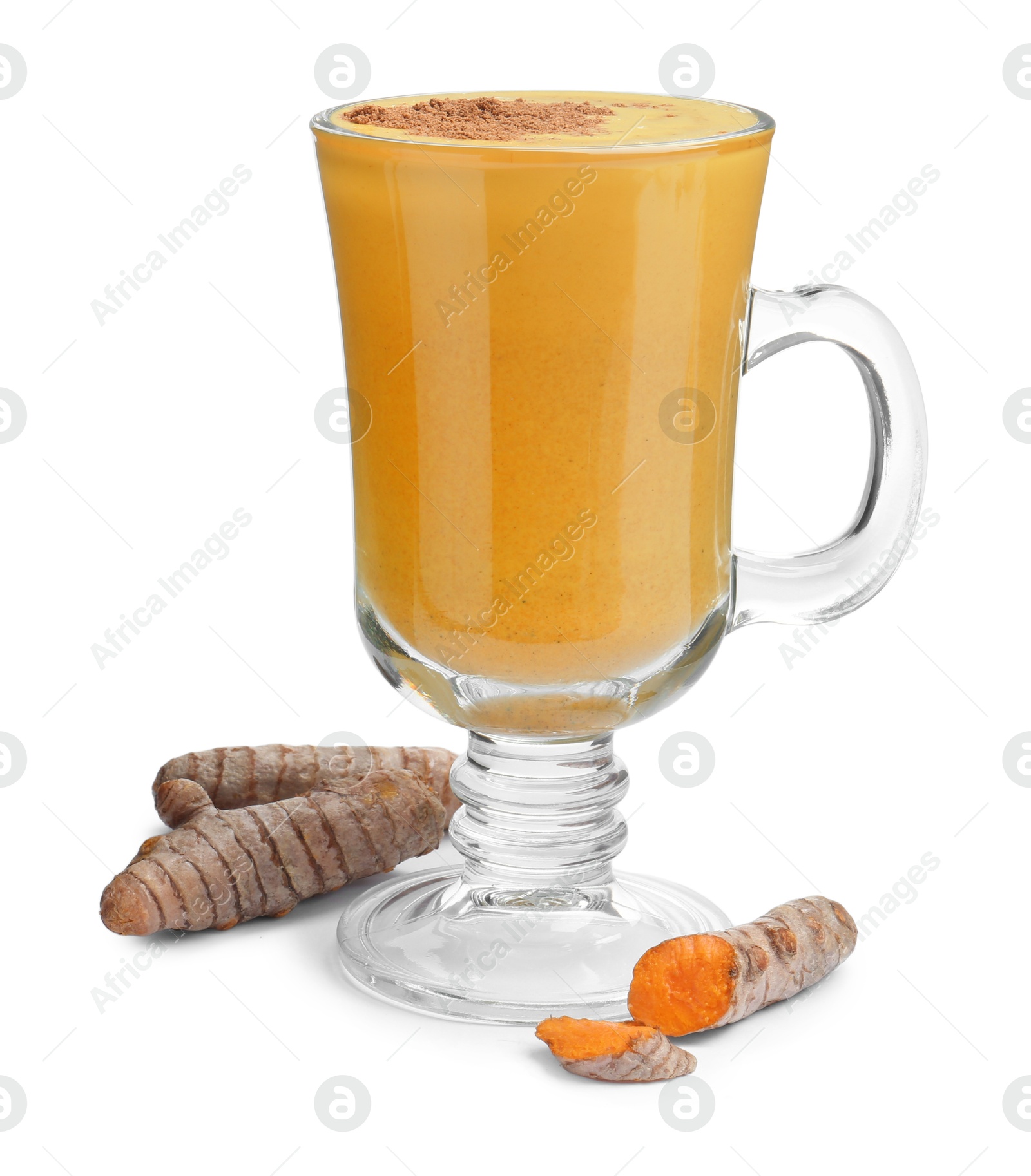 Photo of Delicious turmeric latte in glass cup and roots isolated on white