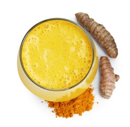 Photo of Delicious turmeric latte in glass, powder and roots isolated on white, top view