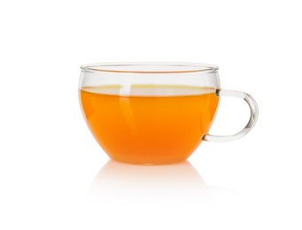 Photo of Aromatic turmeric tea in glass cup isolated on white