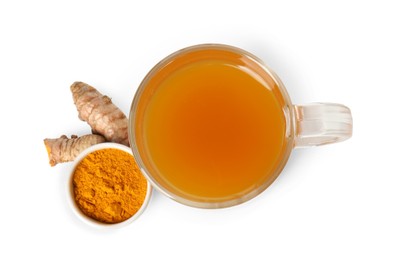 Photo of Aromatic turmeric tea in glass cup, roots and powder isolated on white, top view