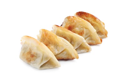 Photo of Delicious fried gyoza dumplings isolated on white