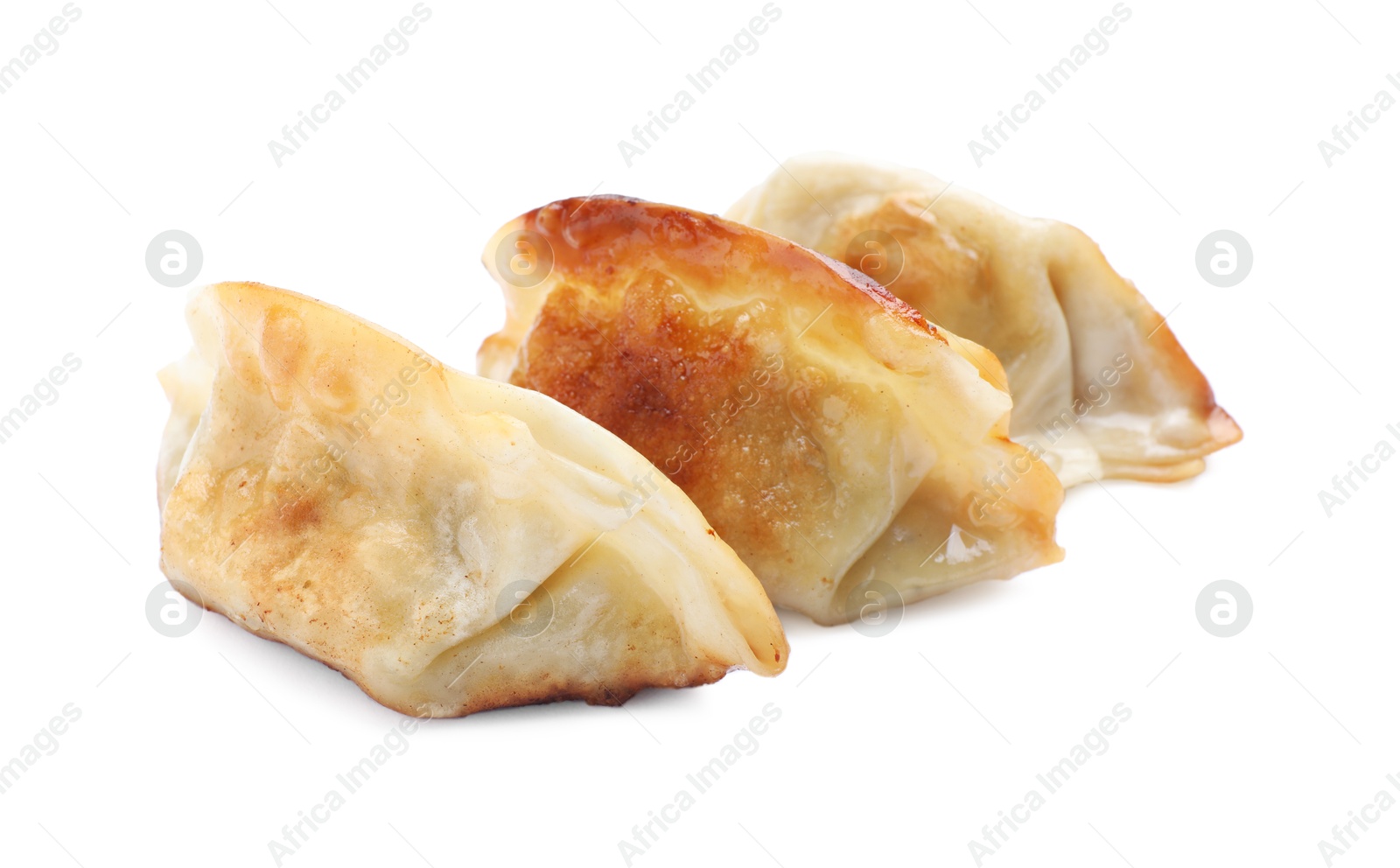 Photo of Delicious fried gyoza dumplings isolated on white