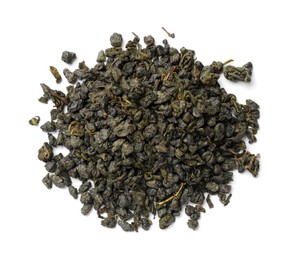 Photo of Pile of dry tea leaves isolated on white, top view