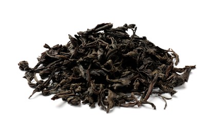 Photo of Pile of dry tea leaves isolated on white