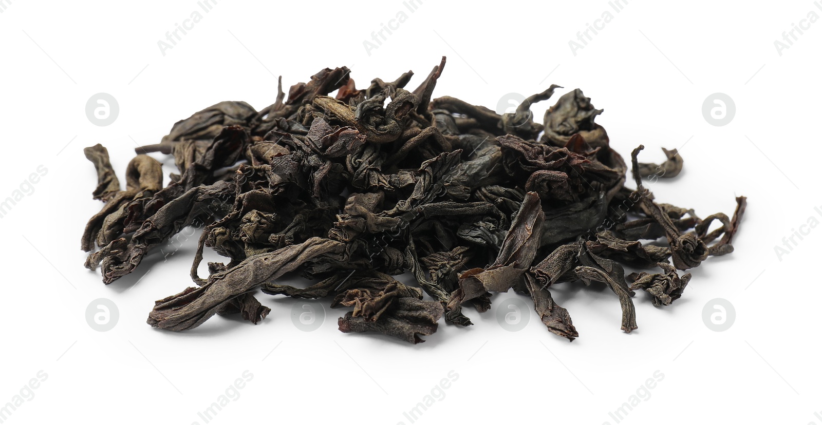 Photo of Pile of dry tea leaves isolated on white