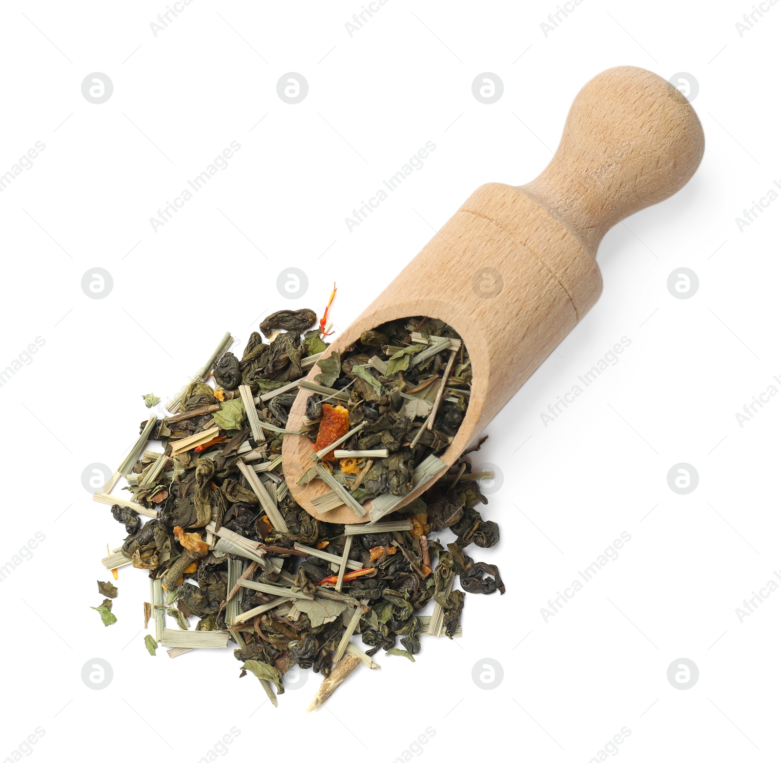 Photo of Dry tea leaves in wooden scoop isolated on white, top view